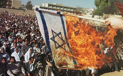 http://joelchernoff.files.wordpress.com/2011/05/israeli-flag-burning.jpg